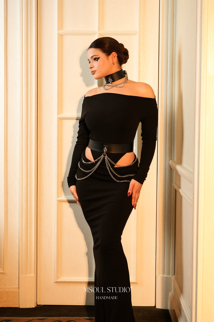 Full-length view of the Cascade Set with a black off-shoulder dress